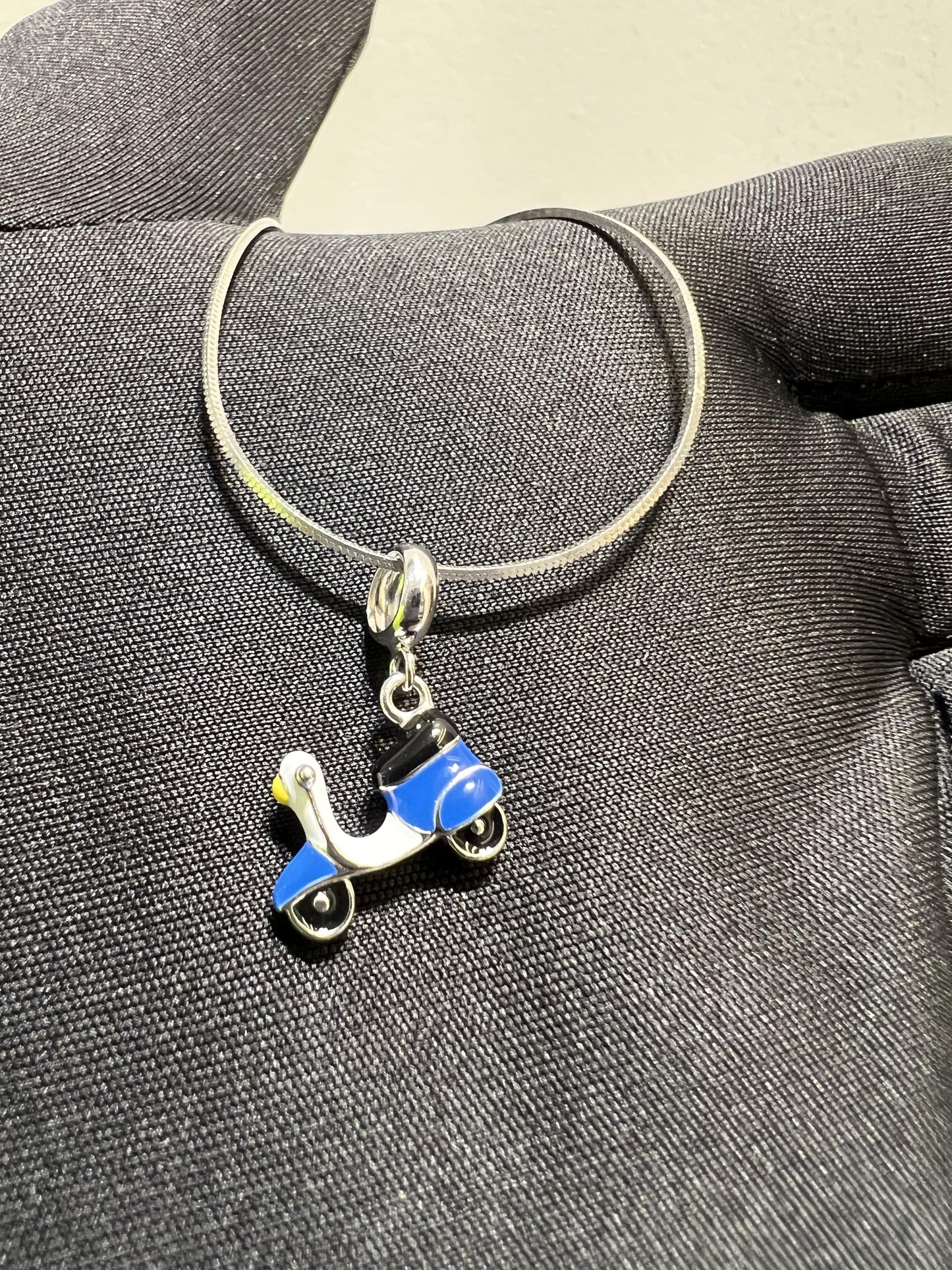 Scooter charm