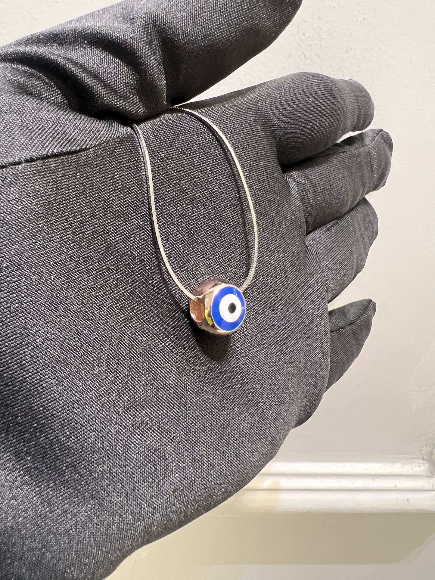 Evil eye charm